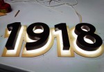 Процесс изготовления вывески "КХ с 1918". Фрезерованные цельноклеенные буквы с LED подсветкой. Окрас "DEEP BROWN". Основа DUBOND.